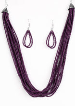 Load image into Gallery viewer, Infused with two large silver fittings, vivacious purple seed beads are threaded along countless strands, creating dramatic layers below the collar for a seasonal look. Features an adjustable clasp closure.  Sold as one individual necklace. Includes one pair of matching earrings.