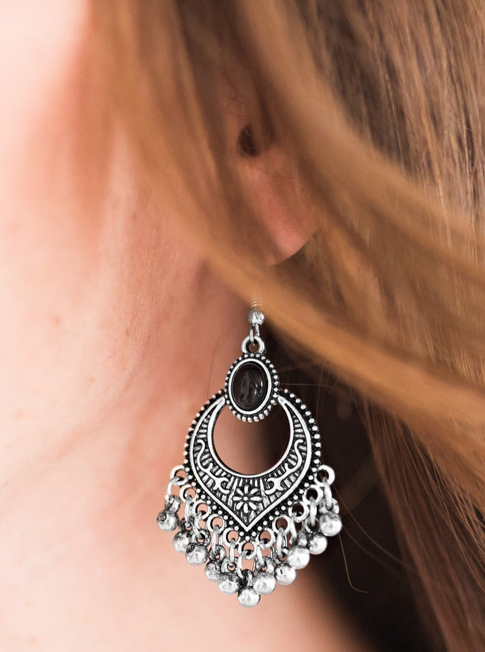 Embossed in a feminine floral pattern, a glistening silver frame gives way to a silver beaded fringe. A black bead is pressed into the top of the frame, adding a perfect pop of color to the wanderlust palette. Earring attaches to a standard fishhook fitting.  Sold as one pair of earrings  