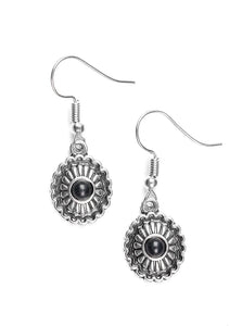 A dainty black bead is pressed into a shimmery silver frame radiating with floral details for a seasonal look. Earring attaches to a standard fishhook fitting.  Sold as one pair of earrings.