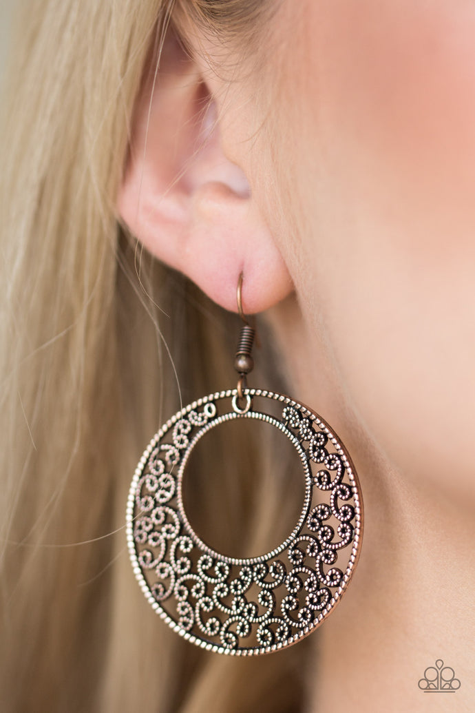 Dotted copper filigree climbs an airy copper frame for a seasonal look. Earring attaches to a standard fishhook fitting.  Sold as one pair of earrings.