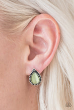 Load image into Gallery viewer, Chiseled into a tranquil teardrop, a glowing green moonstone is pressed into a studded silver frame for a whimsical look. Earring attaches to a standard post fitting.  Sold as one pair of post earrings.  Always nickel and lead free.