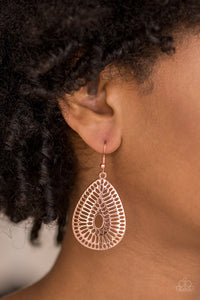 Rippling with grate-like stenciled detail, a shiny copper teardrop frame swings from the ear for a seasonal look. Earring attaches to a standard fishhook fitting.   Sold as one pair of earrings.  Always nickel and lead free.
