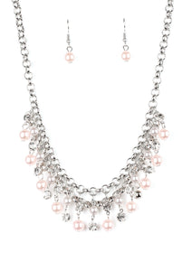 Glittery white rhinestones and classic pink and silver pearls swing from the bottom of interlocking silver chains, creating a bubbly fringe below the collar. Features an adjustable clasp closure.  Sold as one individual necklace. Includes one pair of matching earrings.