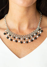 Load image into Gallery viewer, Glittery white rhinestones and classic black beads swing from the bottom of interlocking silver chains, creating a bubbly fringe below the collar. Features an adjustable clasp closure.  Sold as one individual necklace. Includes one pair of matching earrings.  
