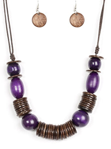 Brushed in a vibrant finish, purple wooden beads and brown wooden discs are threaded along shiny brown cording for a summery look. Features an adjustable sliding knot closure.  Sold as one individual necklace. Includes one pair of matching earrings.