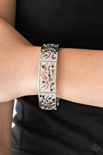 Load image into Gallery viewer, Filled with vine-like filigree, shimmery silver frames are threaded along stretchy bands around the wrist for a whimsical look. Dainty black rhinestones are sprinkled along the ornate frames for a sparkling finish.  Sold as one individual bracelet.   Always nickel and lead free.