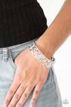 Load image into Gallery viewer, Filled with vine-like filigree, shimmery silver frames are threaded along stretchy bands around the wrist for a whimsical look. Dainty white rhinestones are sprinkled along the ornate frames for a sparkling finish.  Sold as one individual bracelet.  Always nickel and lead free.