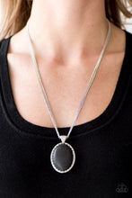 Load image into Gallery viewer, A smooth black stone is pressed into the center of an ornate silver frame, creating a dramatic pendant below the collar. Features an adjustable clasp closure.  Sold as one individual necklace. Includes one pair of matching earrings.  Always nickel and lead free.